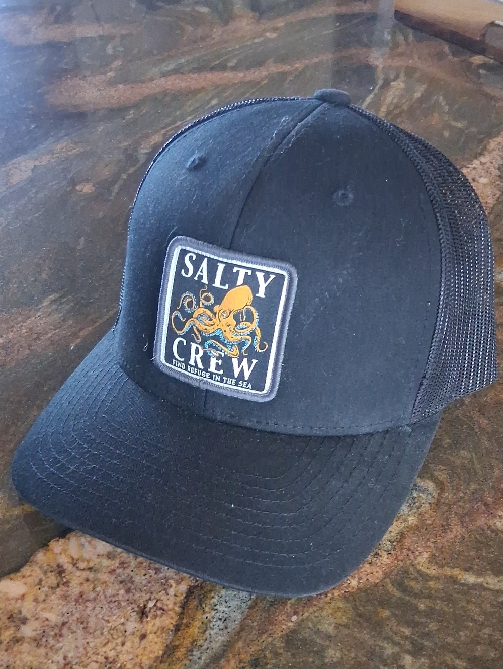 Salty Crew Black Trucker Hat with Yellow Octopus Patch